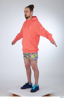 Nigel a-pose blue sneakers dressed floral printed shorts salmon hoodie…